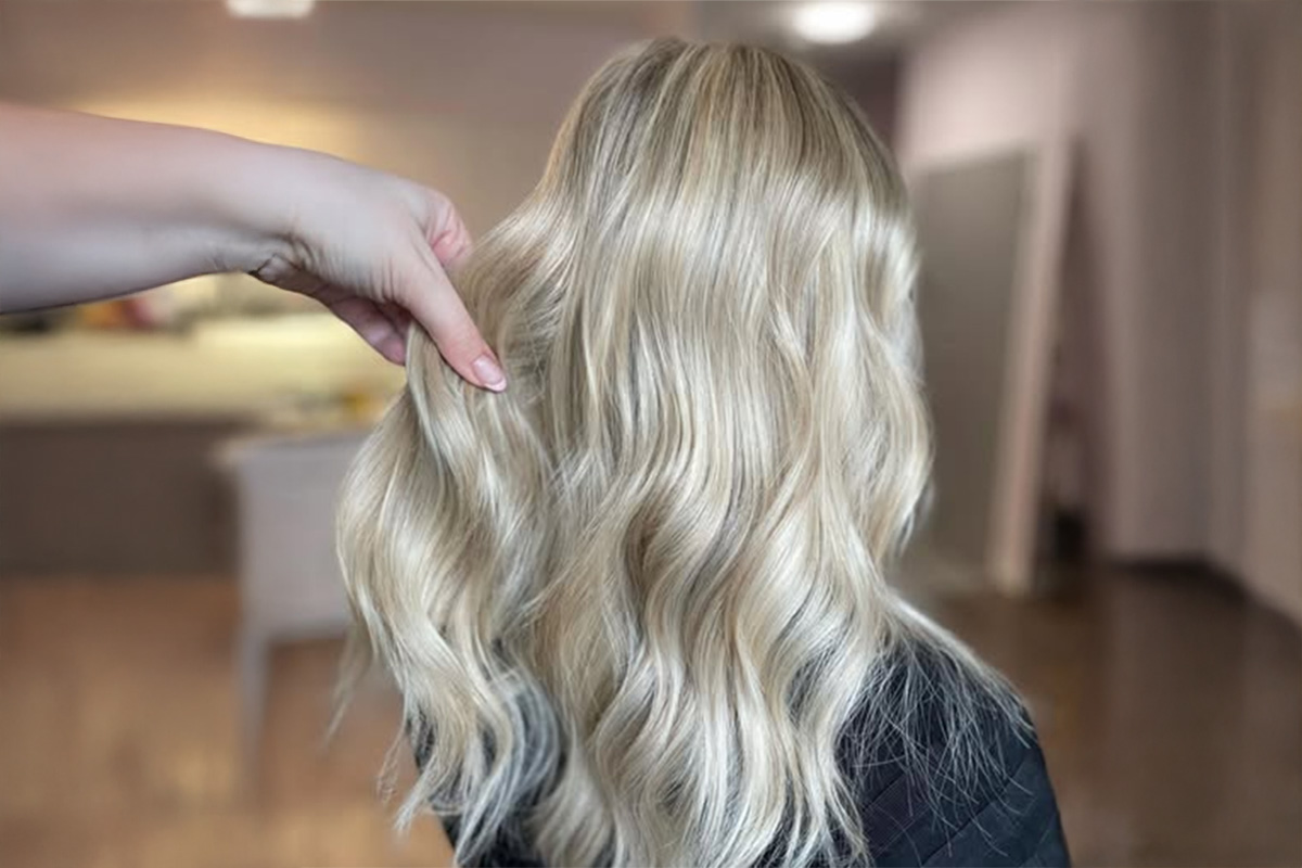 A full head of tight baby lights to make this blonde babe as bright as we could in one session.