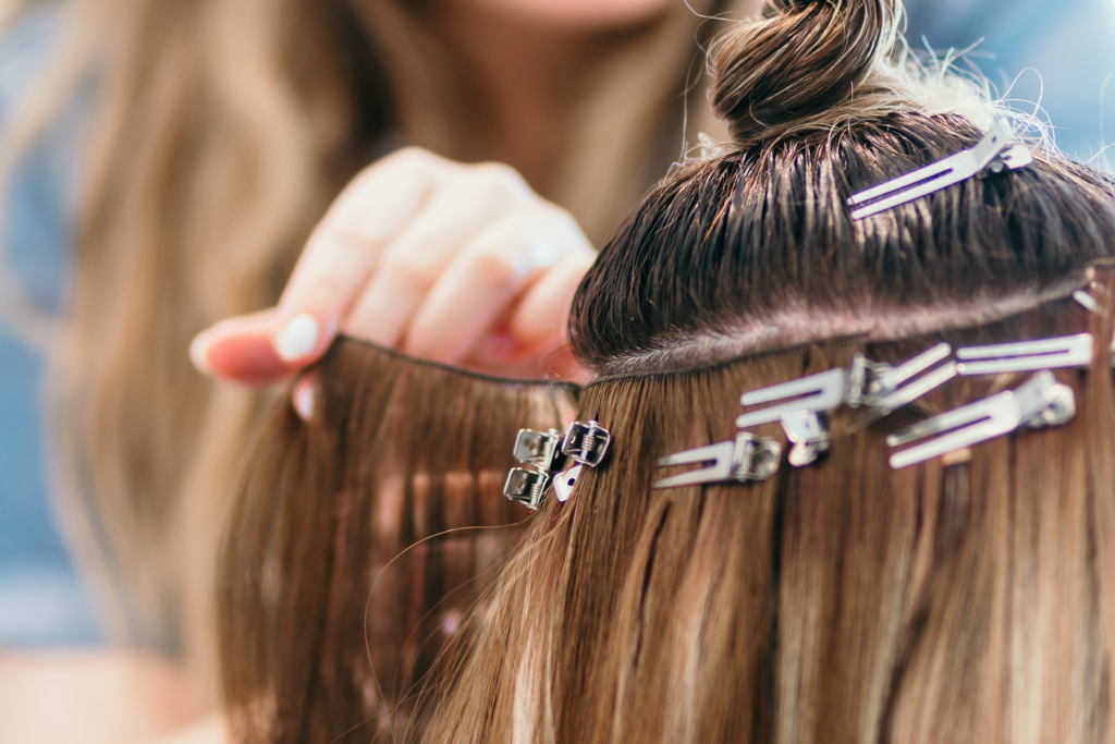 Kayla McMahon, the Canadian Founder Trainer and Director of Trainers for the Luna Method, installing Luna extensions.